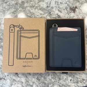 Andar Denver wallet in navy. NWT!!